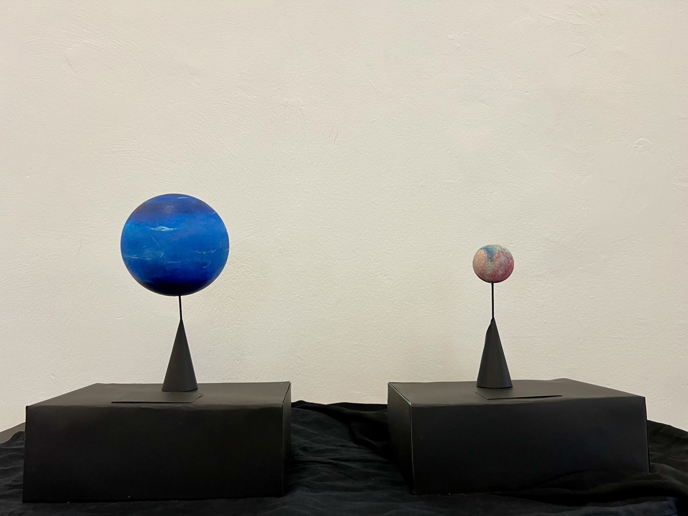 Polystyrene Models of Neptune and Pluto